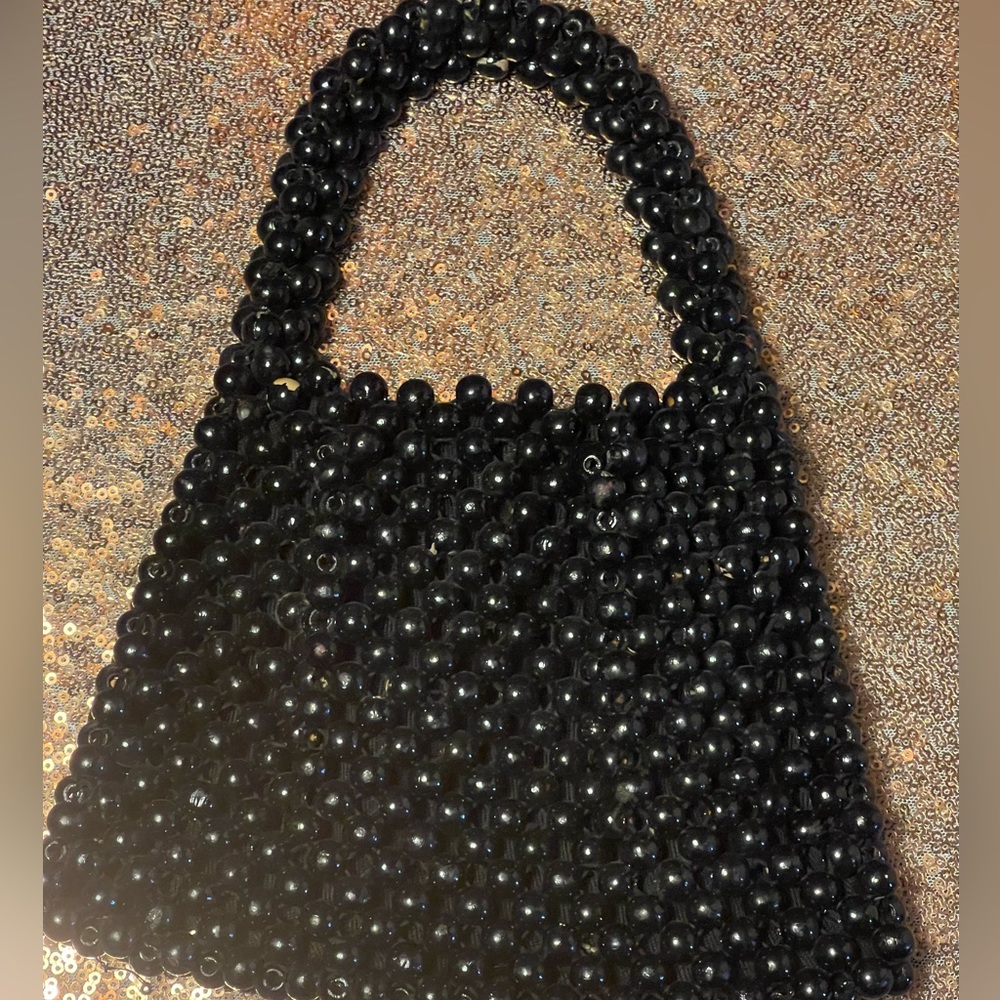 Vintage 1960’s black small wood bead handle bag.